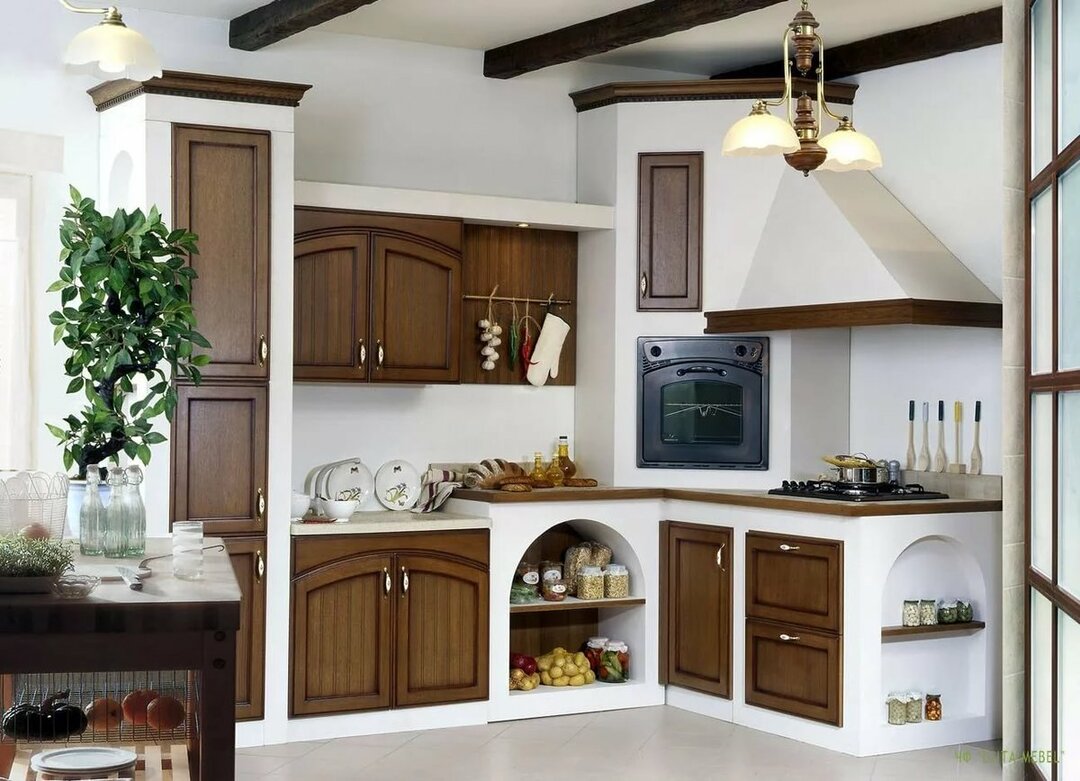 Indbyggede køkkener: fotos, fordele og ulemper ved den indbyggede ovn i interiøret