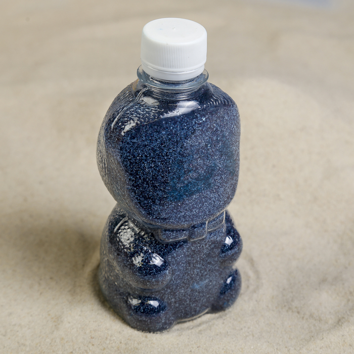 Areia colorida em garrafas \