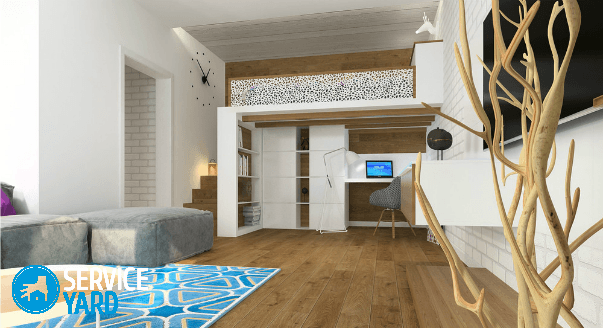 Design of a one-room apartment with a bed