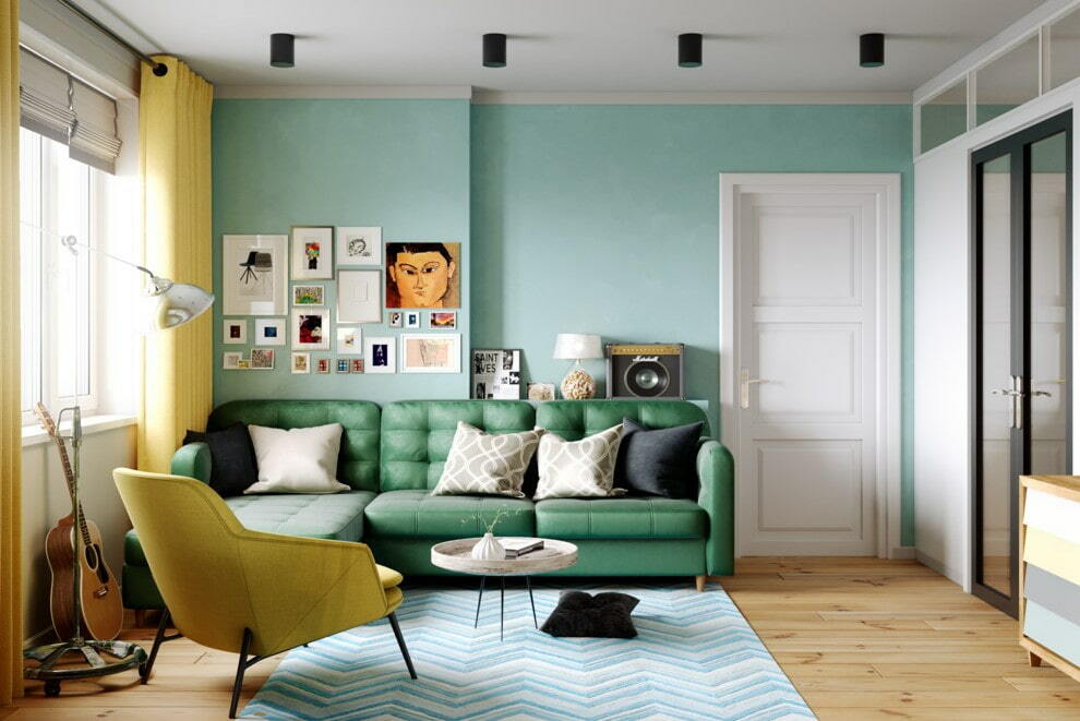 Green sofa in the living room with two doors