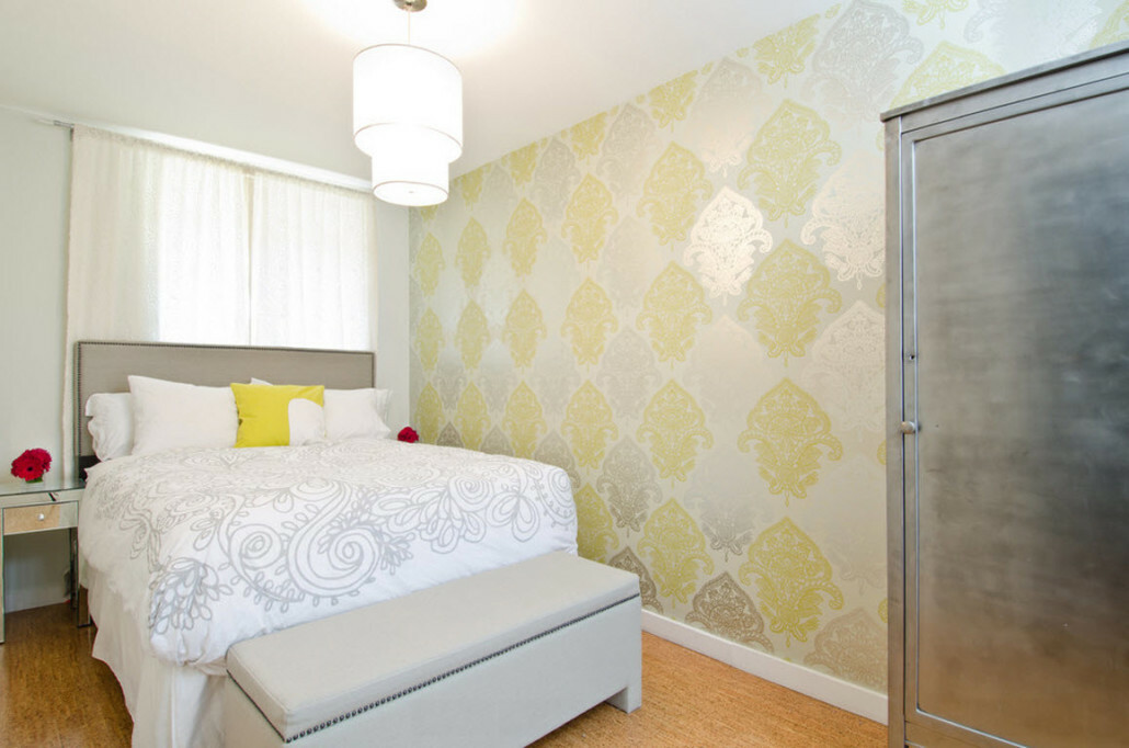 Discreet wallpaper on the wall of a cozy bedroom