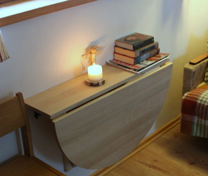 Folding table made of chipboard with separate worktops