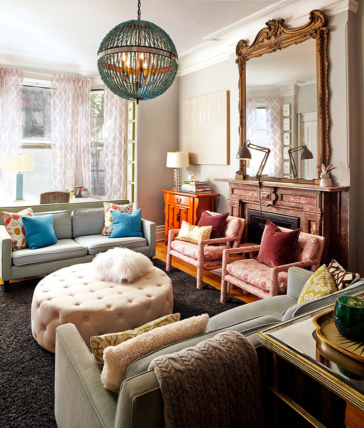 Eclectic living room with a mirror over the fireplace