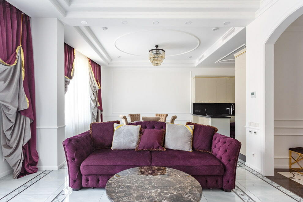 Light pillows on the purple sofa