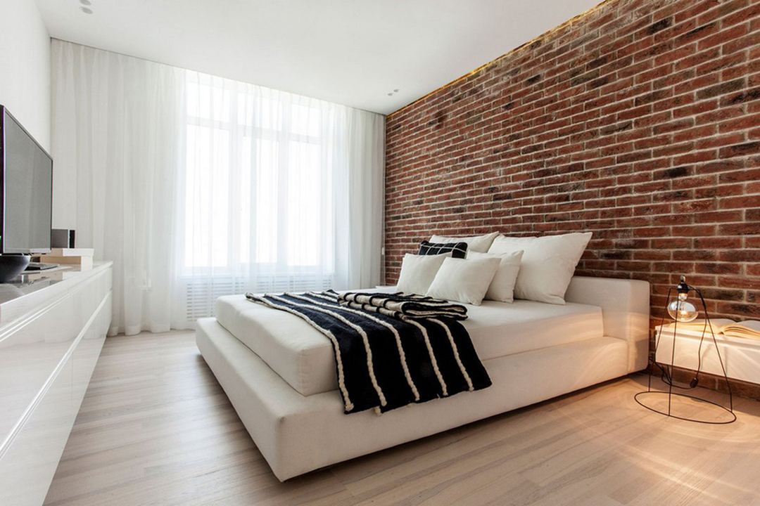 Brick wall in the bedroom