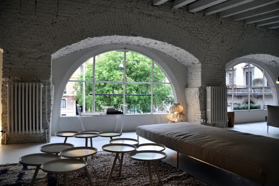 Arch made of stone in an apartment: options for finishing with decorative artificial material photo