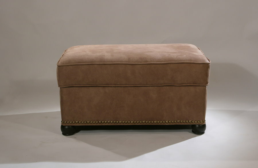 Small ottoman made of natural suede