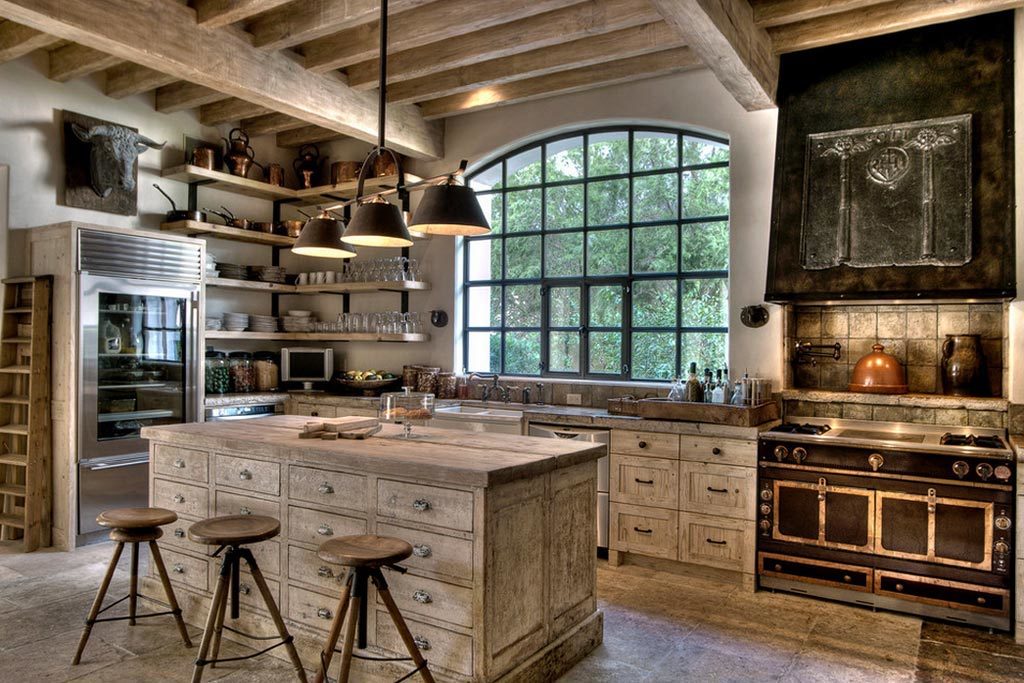 The ceiling is made of wood in the kitchen in country style