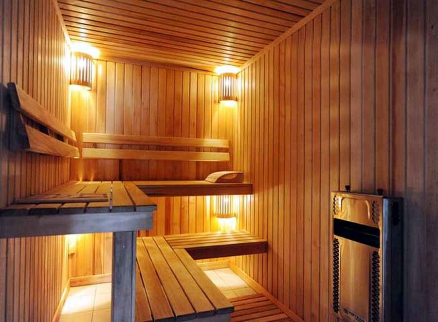Lighting in the steam room with wood paneling