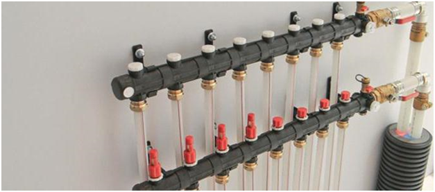 collector-beam heating system with inlet and outlet combs