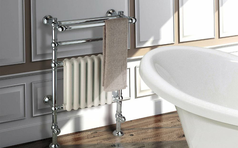 Heated towel rail with radiator in a classic bathroom