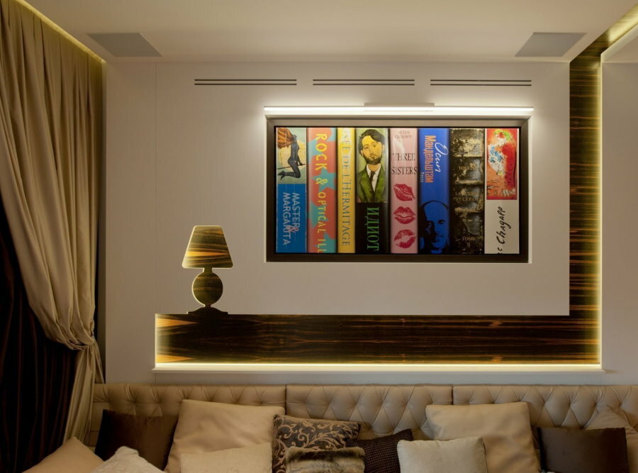 Illuminated painting above the sofa in the hall