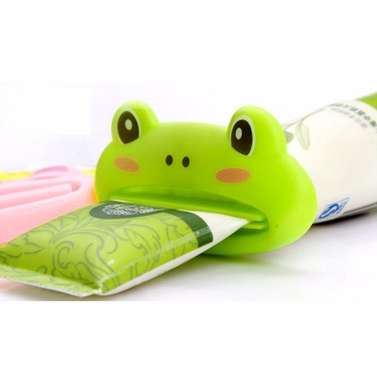 Laite hammastahnan puristamiseen Frog