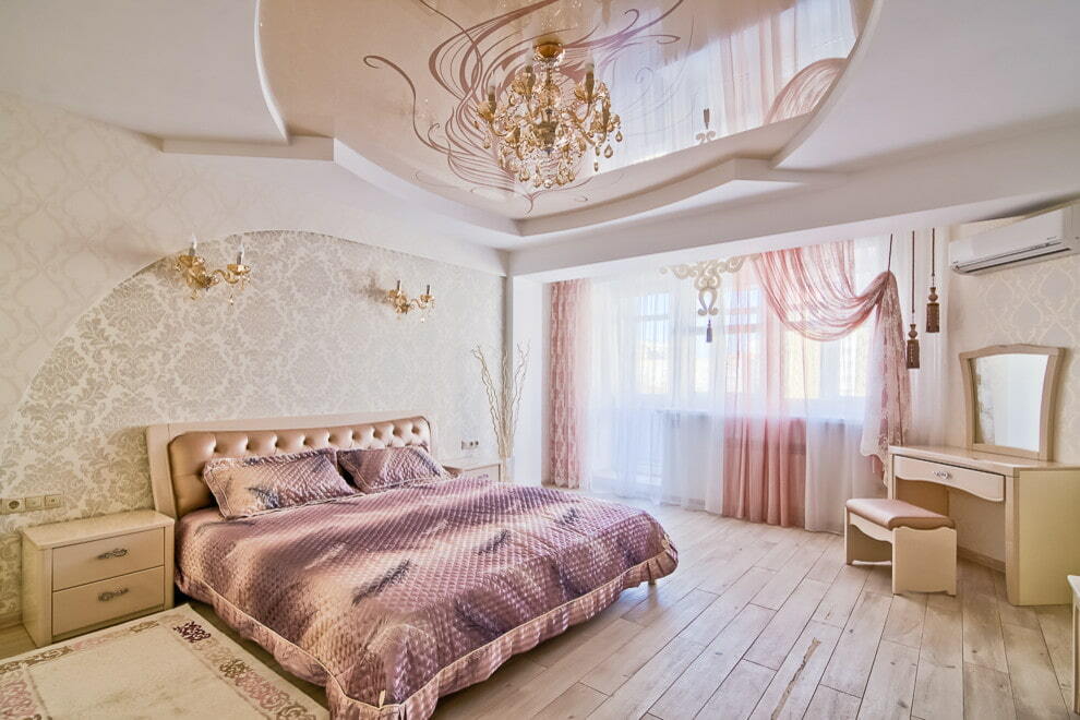 Beige ceiling in a spacious bedroom