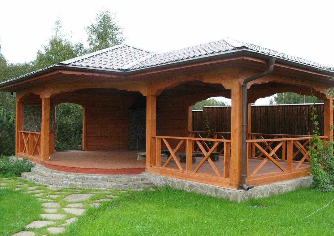 Wooden gazebo with pitched roof