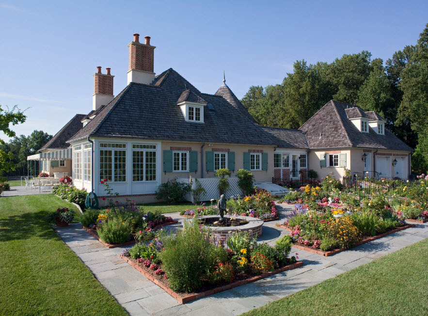 Beautiful flower beds in front of a country house